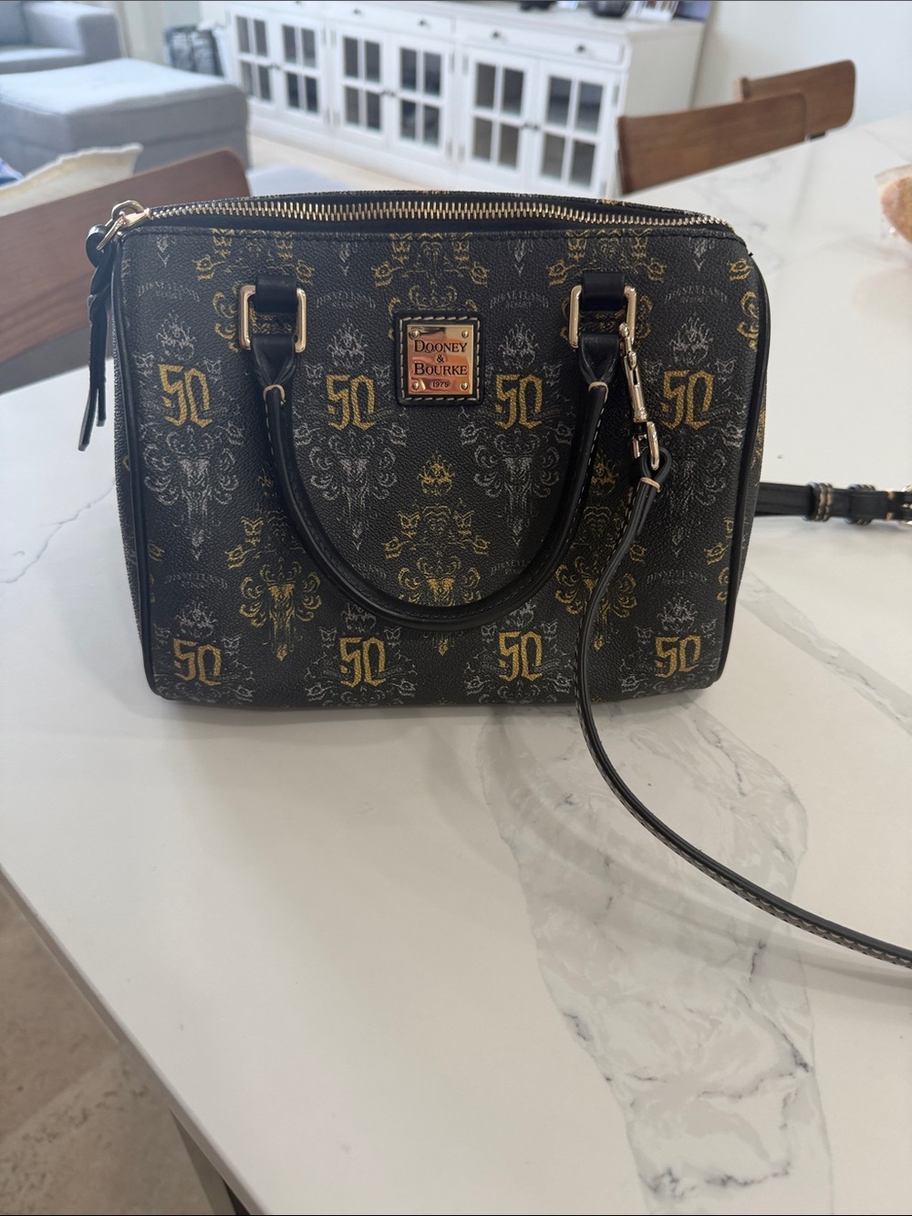 Dooney & Bourke Black and Gold Monogram Satchel